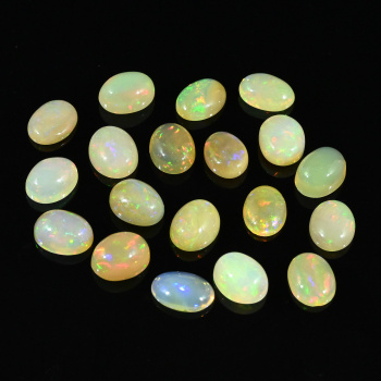 Кабошон из опала овал 7*9мм, 0,85ct арт. ап11067