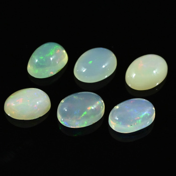 Кабошон из опала овал 6*8мм, 0,85ct арт. ап11054